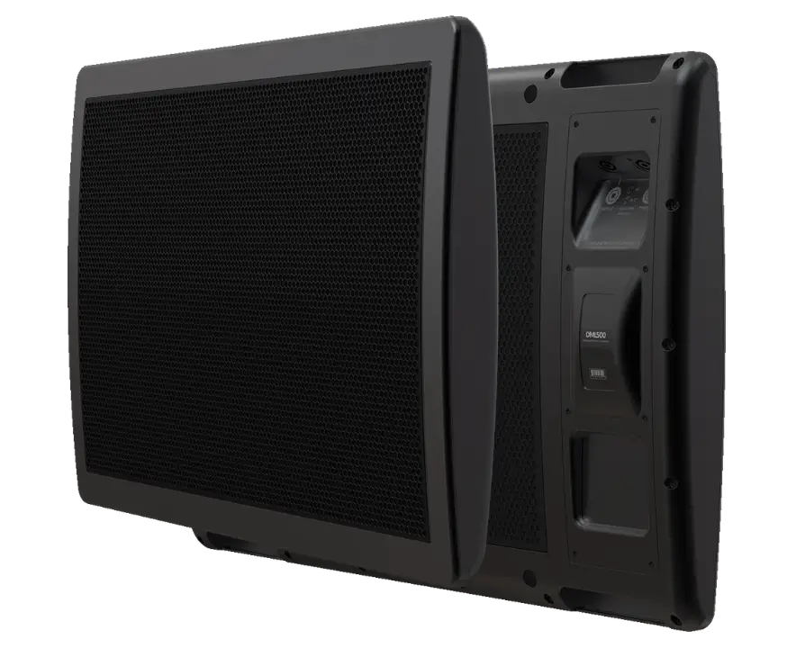 Two black rectangular speakers are shown, one facing forward and the other displaying its rear control panel and inputs.