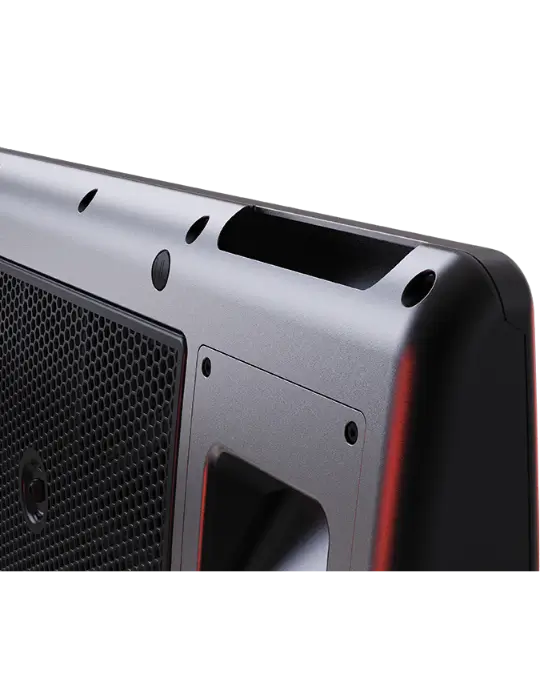 Close-up view of the top corner of a black electronic device, possibly a speaker or audio equipment, showing vents, screws, and part of a handle.