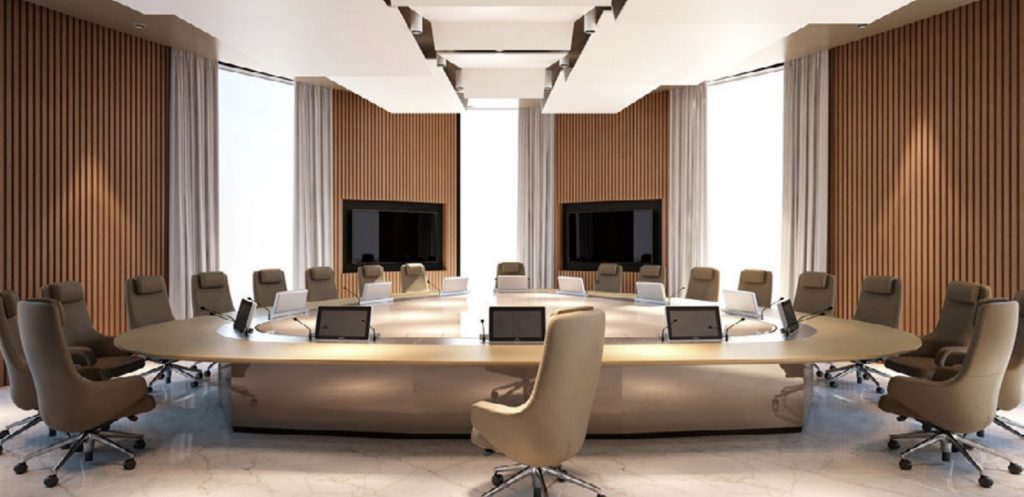 Executive boardroom fitted with Arthur Holm retractable monitors and microphones integrated into the conference table