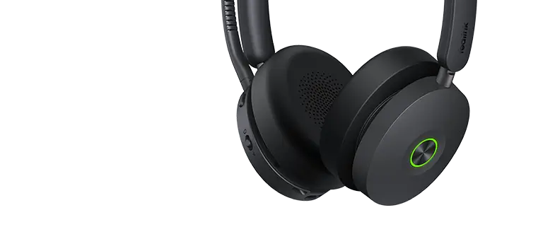 A black wireless gaming headset with a green-lit circular button on the earcup, shown against a plain background.